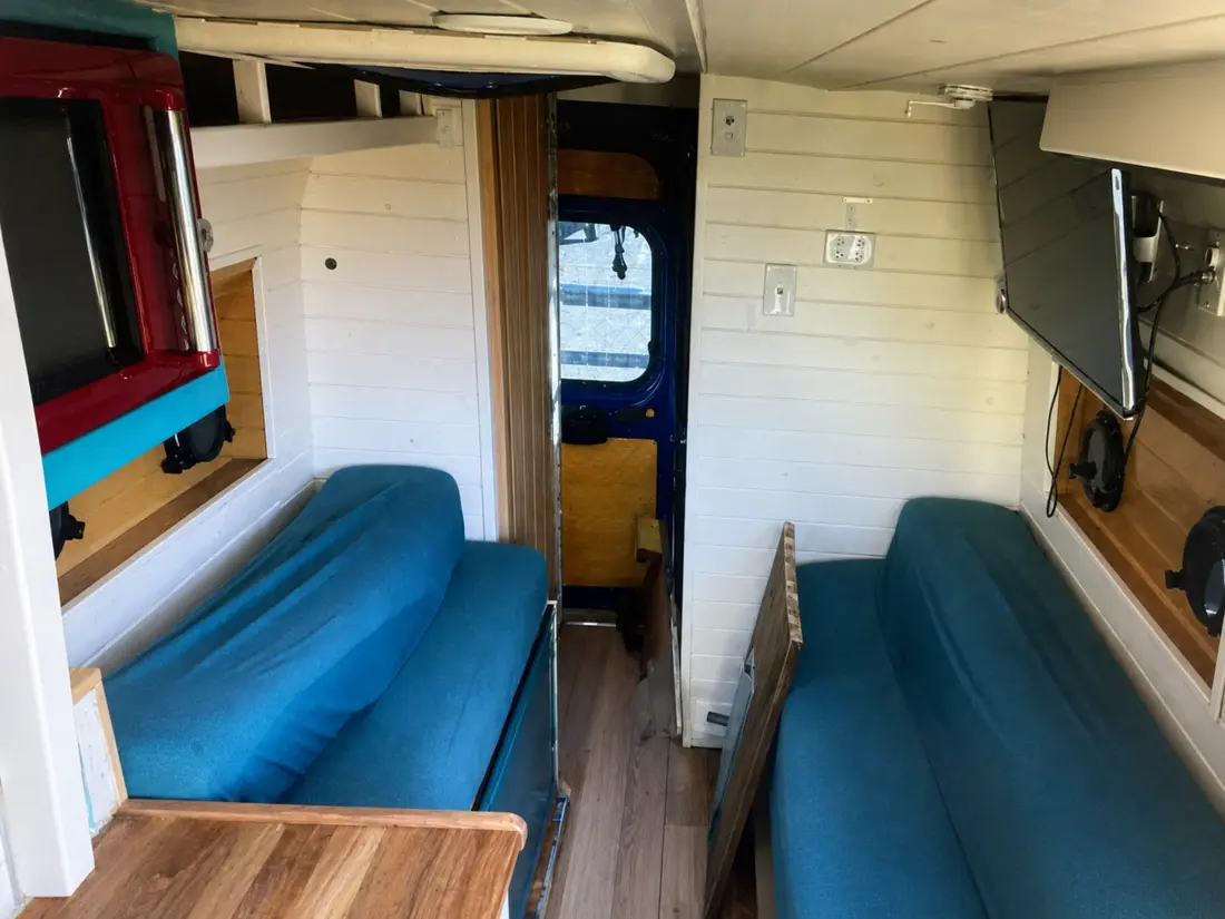 Original campervan lounge before refurbishment
